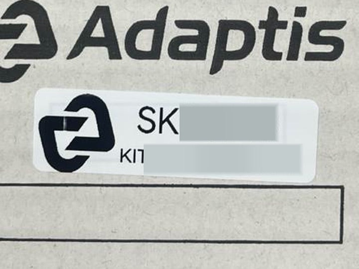 Наклейка з KIT-номером на коробці Adaptis